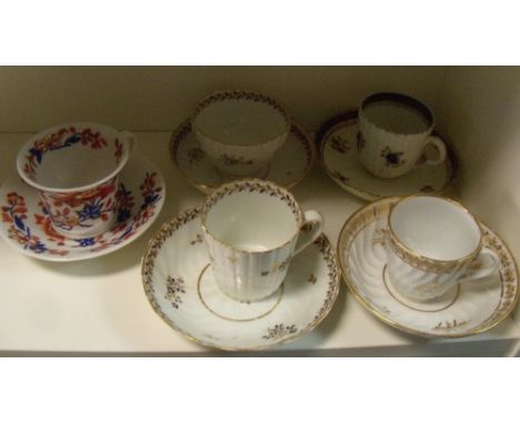 Five 18th/19th century English cups and saucers, to include: a tea bowl, coffee cup and two matching fluted saucers attribute