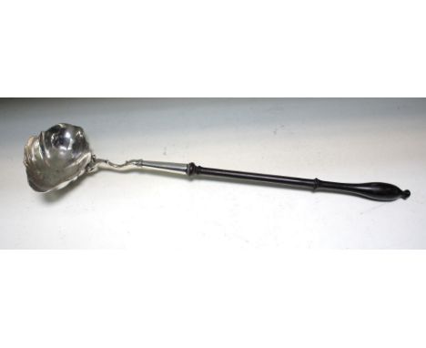 A George II silver punch ladle, no maker's mark visible, London 1737, with oval fluted double lipped bowl, the scrolled taper