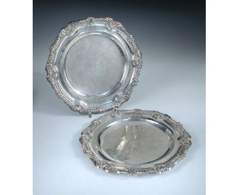 A small pair of George III silver dessert plates, by Paul Storr, London 1813, each circular with shaped shell and foliate gad