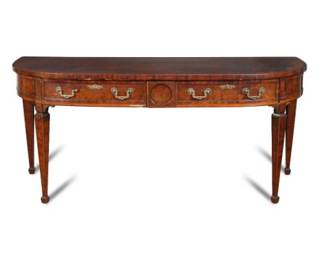 A George III mahogany serving table, with bow ends, satinwood border and ebony line inlays, fitted two drawers, cast brass ha