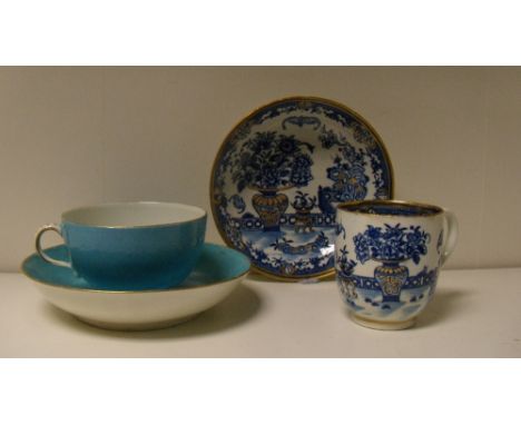 Two Worcester cups and saucers, the tea cup painted in turquoise within gilt lines, the cup with crossed cutlass and 6 mark, 