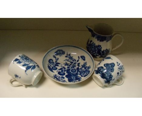 A Pennington and Part, Liverpool blue and white sparrow beak jug, two cups, attributed to Derby and Worcester saucer, the jug