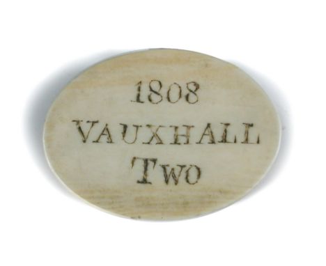 An Ivory Admissions Token to Vauxhall Gardens, 1808, to hear Miss Fearon, the oval token engraved and stained with date and '