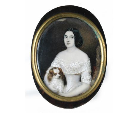Michele Albanesi (Italian, 1816-1878) A portrait miniature of a girl with her King Charles spaniel signed and dated verticall