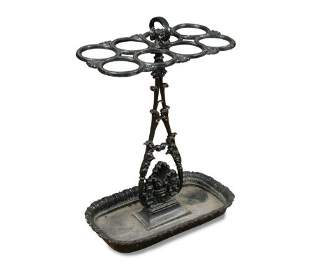 A 19th century cast iron stick stand, with leaf cast column, tray base and lapit moulded border 64 x 47cm (25 x 18in)  No app