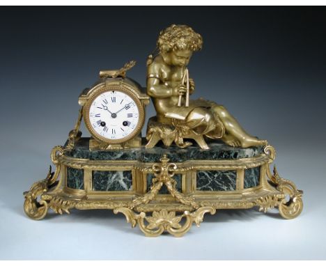 A 19th century French ormolu figural mantle clock, the drum case with 8.5cm enamel dial marked 'Paris', and bell striking mov