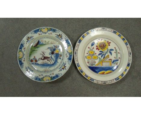 Two mid 18th century English Delft polychrome dishes, one possibly Bristol painted with a manganese deer within four shell an