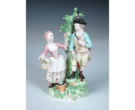 A patch marked Derby group representing Autumn and Summer, the lady offering flowers to a man standing by a tree resting the 