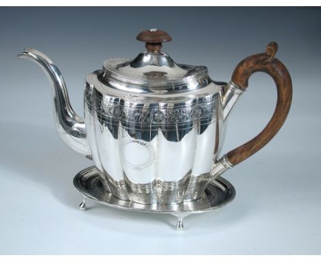 A George III silver matched teapot and stand, the teapot by George Smith (II) & Thomas Hayter, London 1802, oval with lobed b