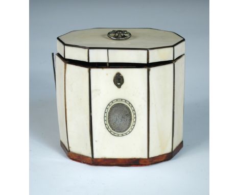 A George III ivory decagonal tea caddy, with tortoiseshell stringing and banding, a white metal initialled cartouche to the f