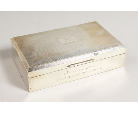 AN ENGINE TURNED SILVER CIGARETTE CASE. Birmingham 1954.