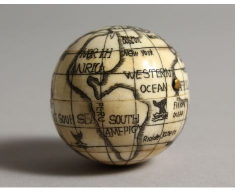 A COMBINATION BONE GLOBE/COMPASS. 1.75ins diameter.