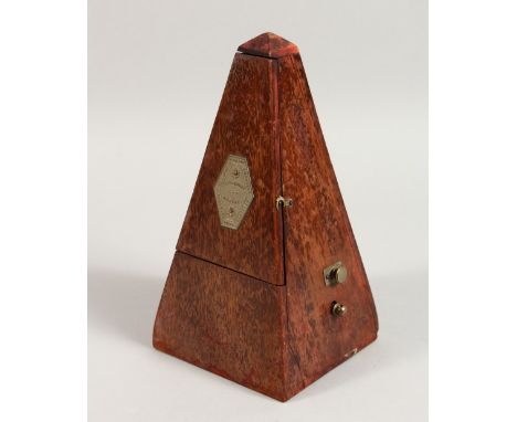 A MAHOGANY CASE METRONOME.