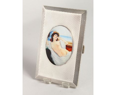 A GOOD ENGINE TURNED SILVER CIGARETTE CASE, the lid with an enamel of a nude. Birmingham 1936.
