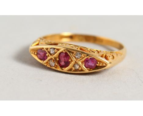 AN 18CT YELLOW GOLD, RUBY AND DIAMOND RING.