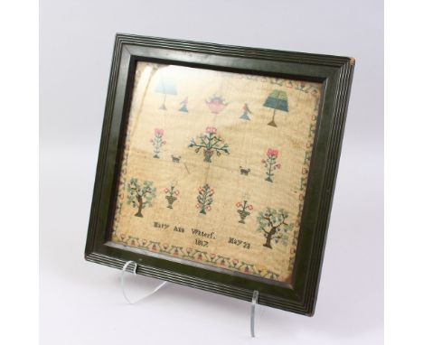 A GEORGE III FRAMED SAMPLER, Mary Ann Waters, May 23, 1817. 11ins x 12ins.