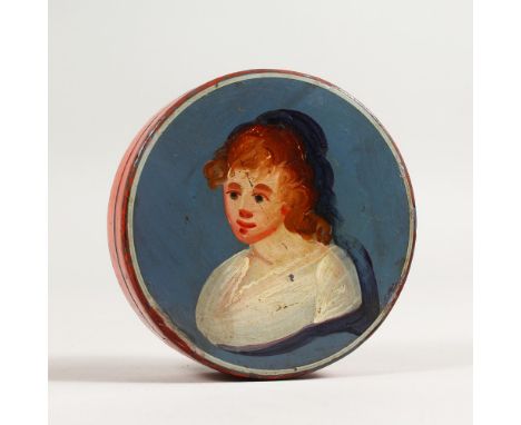 AN EARLY 19TH CENTURY CIRCULAR PAPIER MACHE PATCH BOX, painted with a portrait bust. 3.25ins diameter.