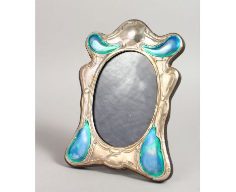 AN ART DECO DESIGN SILVER AND BLUE ENAMEL PHOTOGRAPH FRAME, with large blue enamel scrolls. 8ins x 5.5ins.