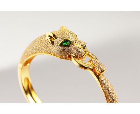 A GOOD GOLD PLATE PANTHER BANGLE.