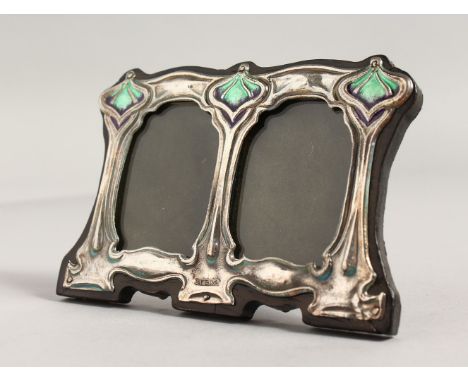 A SILVER AND ENAMEL ART DECO STYLE PHOTOGRAPH FRAME.