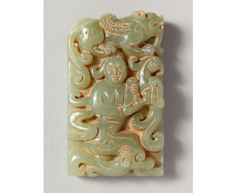 A CARVED JADE PENDANT. 2.5ins high.