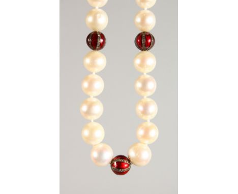 A PEARL NECKLACE, with three diamond and enamel sections and 18ct gold clasp. 18ins long.