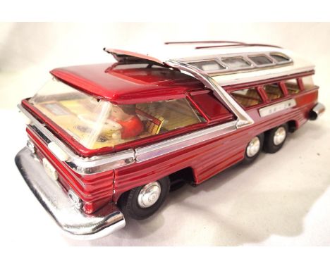Battery operated tinplate model bus, Bump and Go action, approximately 30 cm. Very good - excellent condition. P&amp;P Group 