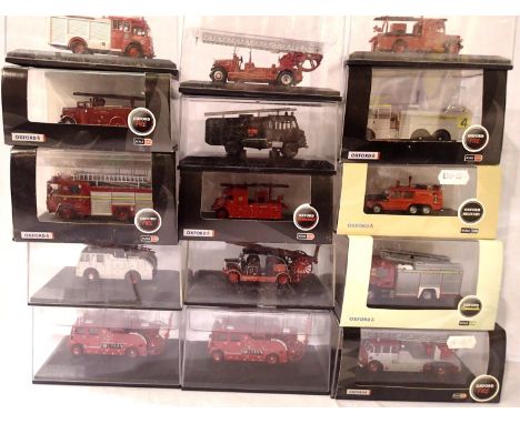 Fifteen Oxford diecast OO scale fire engines, various types. Mostly in excellent condition, boxes with wear, missing sleeves 