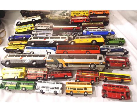 Approximately x35 diecast buses and coaches, all unboxed, ex display. May have paint chips, parts missing etc. P&amp;P Group 