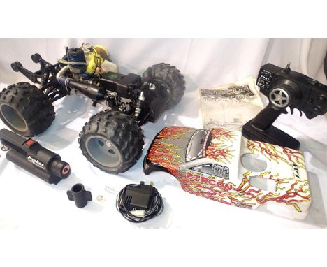 Racing monster truck 4WD .256cl nitro engine with pocket start. 2CH radio control with instructions. Appears little used, unt