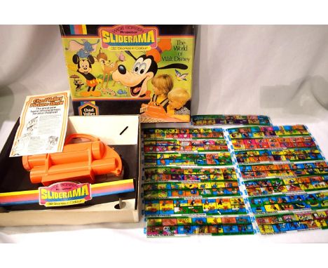Chad Valley wide screen projector, The World of Walt Disney with fifteen colour slides, instructions etc. P&amp;P Group 1 (£1