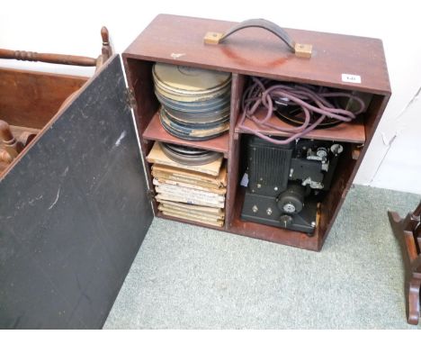Specto 9.5mm Cased Projector with assorted Reels inc. Oliver Twist, Army marching on Rome etc. 