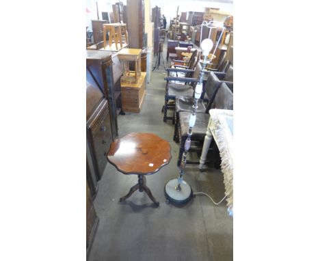 A brass and onyx standard lamp and a Sorrento ware occasional table 