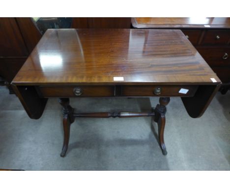 A set of three oak dining chairs and a mahogany drop-leaf sofa table 