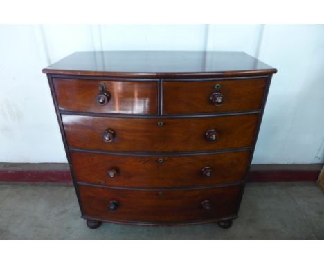 A Victorian mahogany bow front chest of drawers 