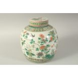 A LARGE CHINESE FAMILLE VERTE PORCELAIN JAR AND COVER, enamel painted with birds and flora, together