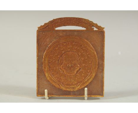 A CHINESE JADE OR HARDSTONE GILDED PENDANT, 11cm x 9.5cm.