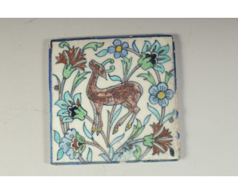 AN EARLY 20TH ARMENIAN JERUSELUM GLAZED POTTERY TILE, depicting a deer, 12.5cm x 12.5cm.