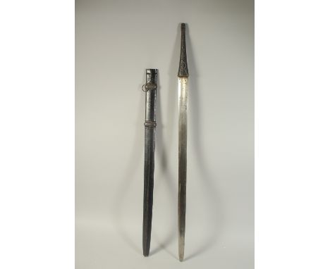 A FINE 19TH CENTURY ARAB OMANI SILVER WIRE INLAID SWORD, with original decorated leather scabbard, 104cm long.