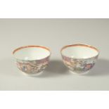 A PAIR OF CHINESE EXPORT PORCELAIN CUPS, each painted with scenes of figures, 8.5cm diameter.