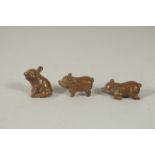 THREE SMALL BRONZE PIGS, each approx. 2.5cm, (3).