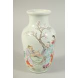 A CHINESE FAMILLE ROSE PORCELAIN VASE, enamel painted with figures in a garden, 21.5cm high.