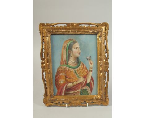 AN INDIAN FEMALE PORTRAIT OIL PAINTING ON BOARD, framed and glazed, image 23.5cm x 17cm.