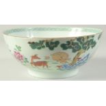 AN 18TH CENTURY CHINESE FAMILLE ROSE PORCELAIN BOWL, the exterior painted with a scene of deer