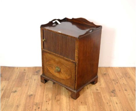 A mahogany cupboard, with three-quarter gallery tray-style top, above a tambour fronted cupboard, single drawer below fitted 