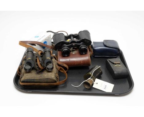 A pair of Dollond London binoculars, in carry case; a pair of Noctovist 8x30 binoculars, in carry case; a pair of Row opera g