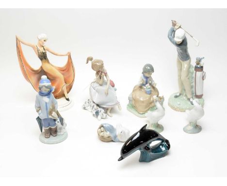 A selection of decorative ceramic figures, including: a Lladro figure of a golfer; two Lladro figures of children; a Poole Po