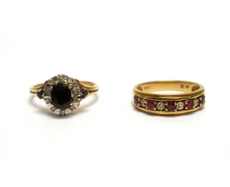 A sapphire and diamond cluster ring, on 9ct yellow gold shank, size L 1/2, 3.2g; and a ruby and diamond half eternity ring, s