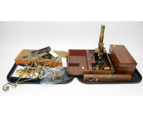 A students brass microscope, by W. Watson &amp; Sons Ltd, London, in box; together with a spirit level; a Magneto-Electric Ma