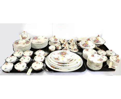 A Royal Worcester ‘Roseland’ pattern dinner and coffee service, decorated with colourful rose bouquets on a white ground, com